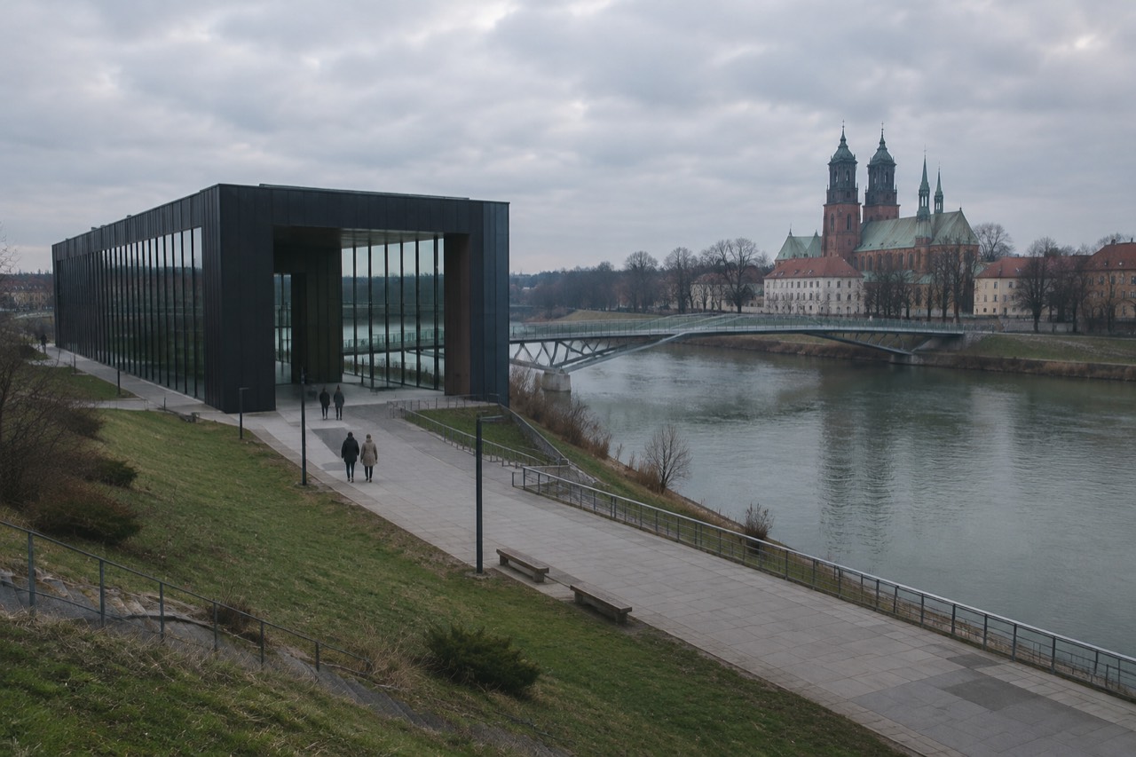Modern visitor centre building on the bank of the Warta river opposite the cathedral island in Poznan