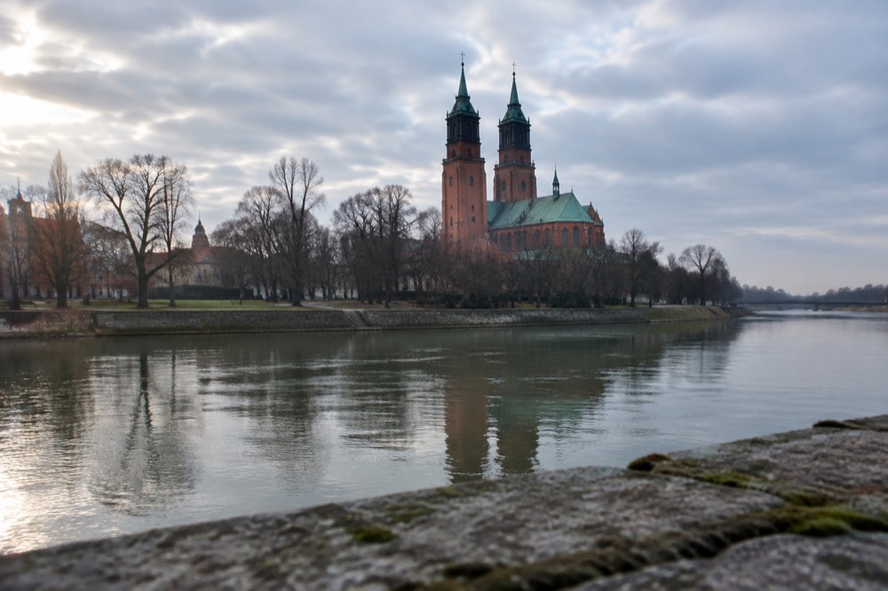 The twin towers of Poznan Cathedral on Ostrow Tumski seen across the Warta river
