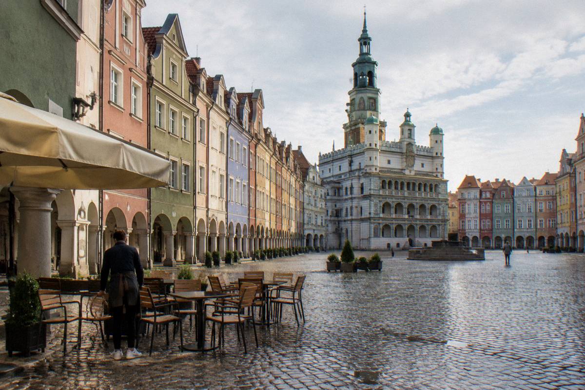 Early morning on the cobbles of Poznan Old Market Square