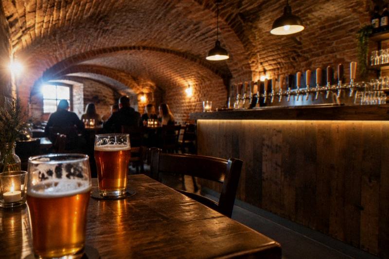 A brick-vaulted craft beer bar in Poznan